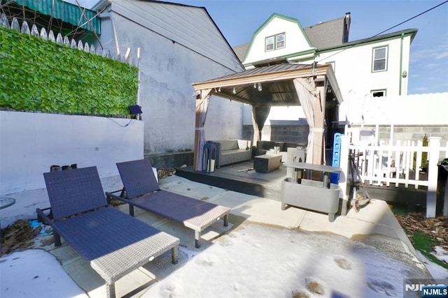 view of patio with a gazebo and an outdoor hangout area