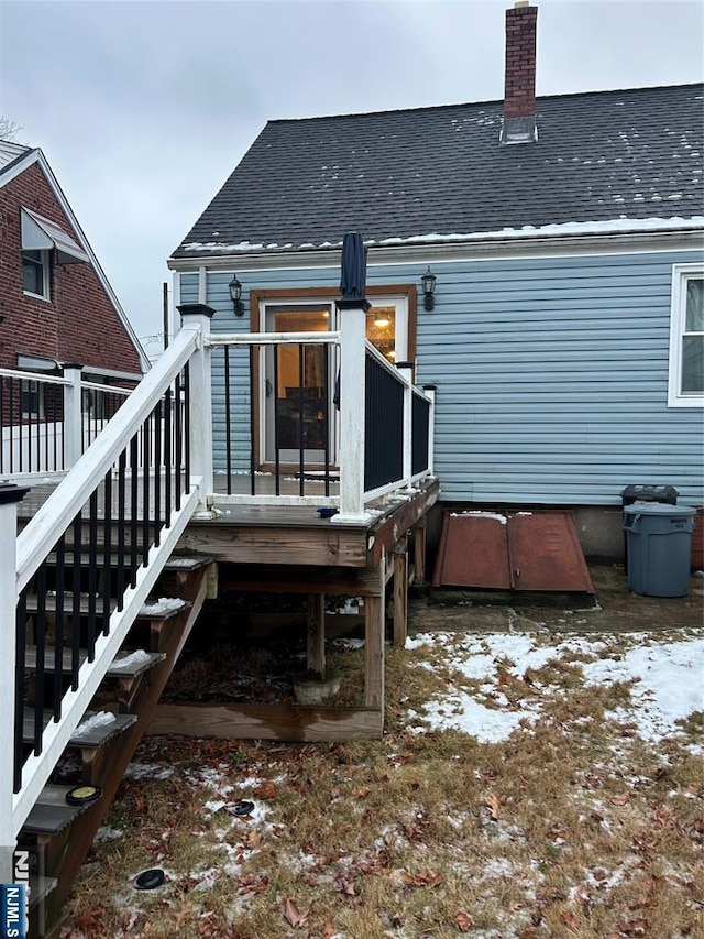 view of snow covered house