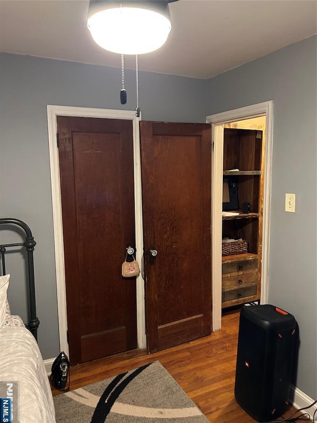 bedroom featuring hardwood / wood-style floors