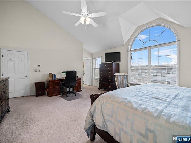 bedroom with light carpet, high vaulted ceiling, and ceiling fan