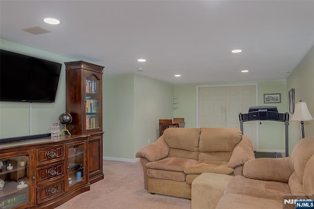 living room featuring light carpet