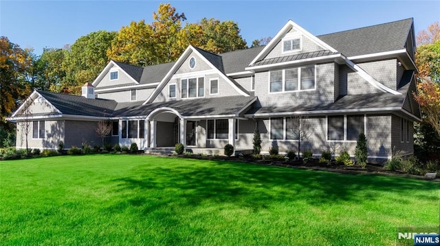 view of front of house with a front lawn