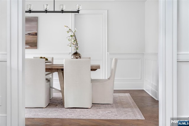 dining space featuring hardwood / wood-style floors