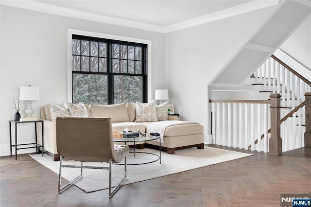 living area featuring parquet floors and crown molding