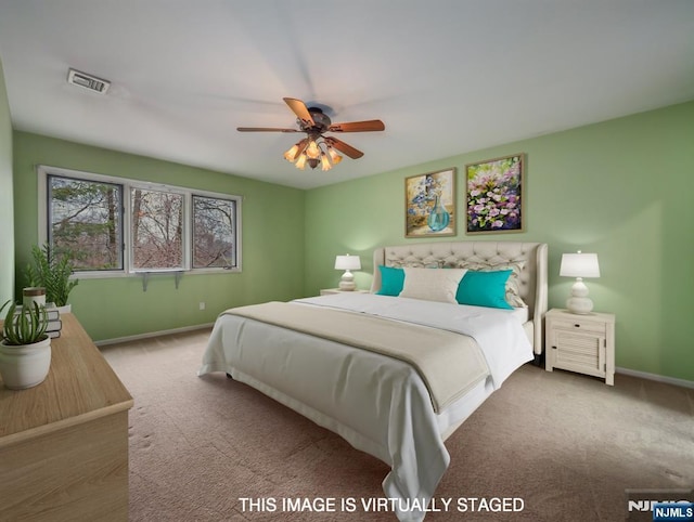 carpeted bedroom featuring ceiling fan