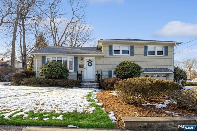 tri-level home with a garage