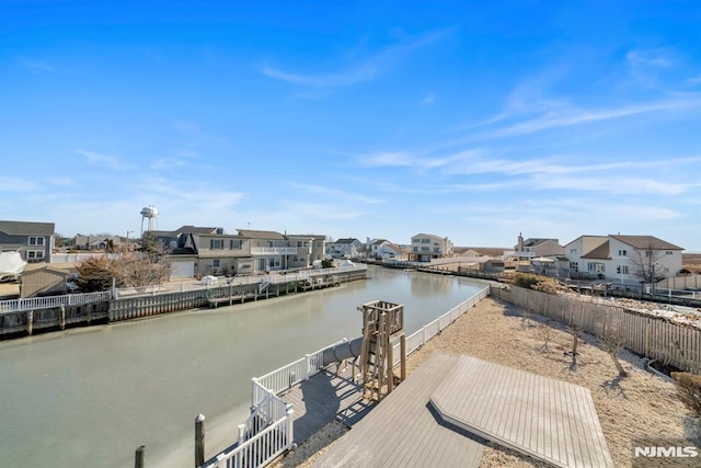 dock area featuring a water view