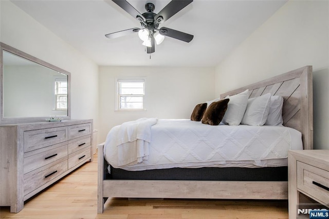 bedroom featuring ceiling fan and light wood-type flooring