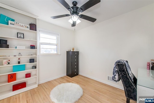 office area featuring ceiling fan and light wood-type flooring