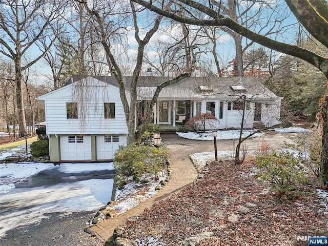 view of front of property with a garage