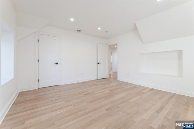 bonus room featuring light hardwood / wood-style flooring