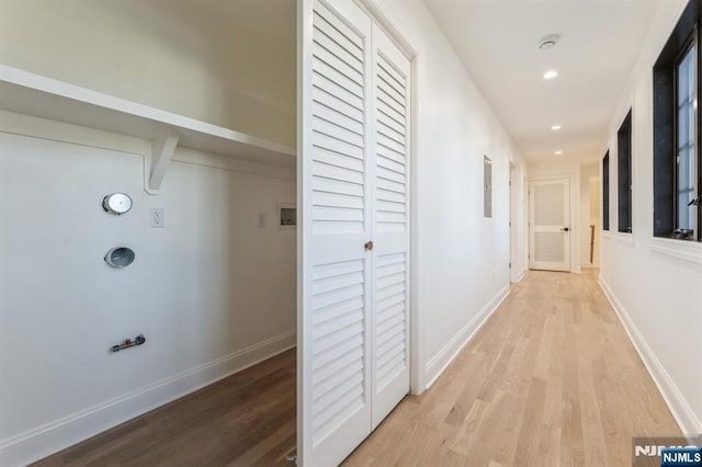 hallway featuring light wood-type flooring