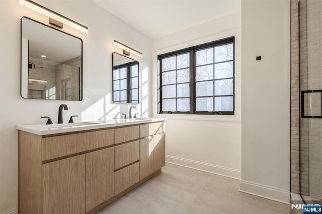 bathroom featuring vanity and walk in shower