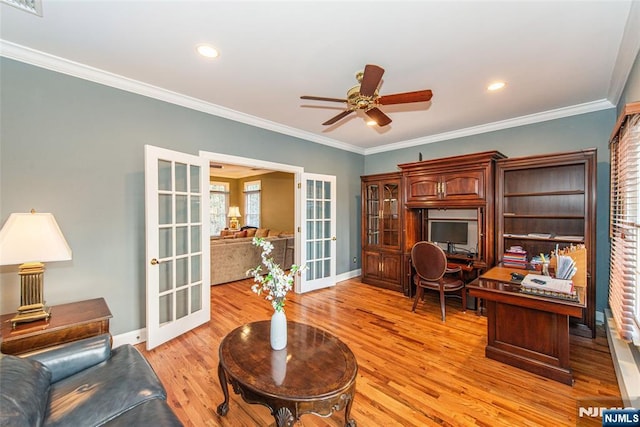 office area with ornamental molding, light hardwood / wood-style flooring, and french doors