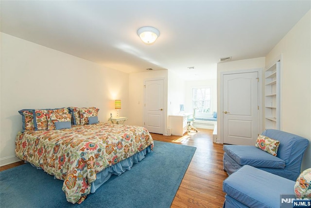 bedroom featuring hardwood / wood-style flooring