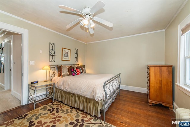 bedroom with multiple windows, crown molding, dark hardwood / wood-style floors, and ceiling fan