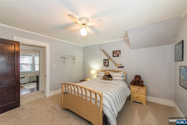 bedroom with crown molding, light colored carpet, radiator, and ceiling fan