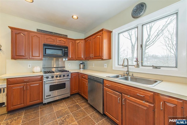 kitchen with appliances with stainless steel finishes and sink