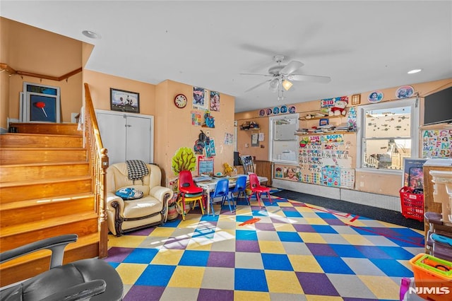 recreation room featuring ceiling fan