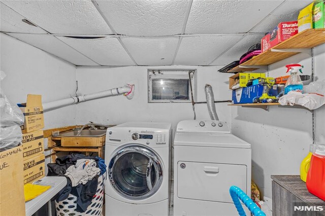 laundry room featuring washing machine and dryer