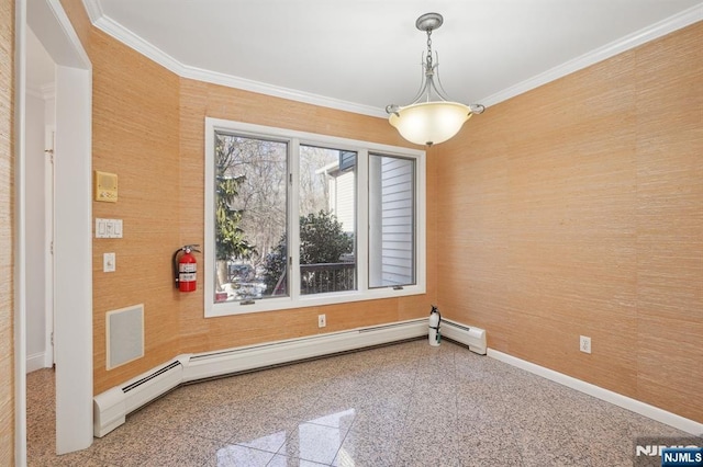 empty room with a baseboard heating unit and crown molding