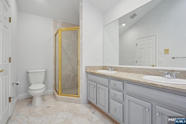 bathroom featuring vanity, lofted ceiling, toilet, and walk in shower