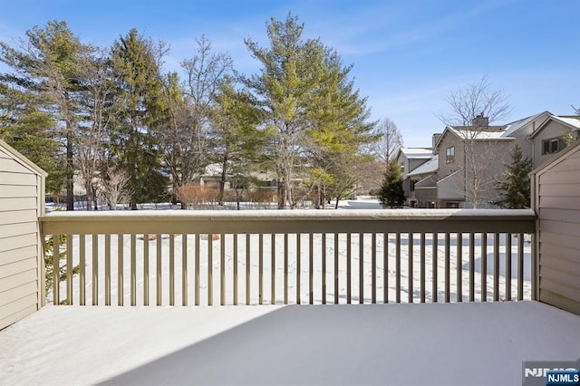 view of snow covered deck