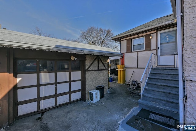 exterior space with a garage