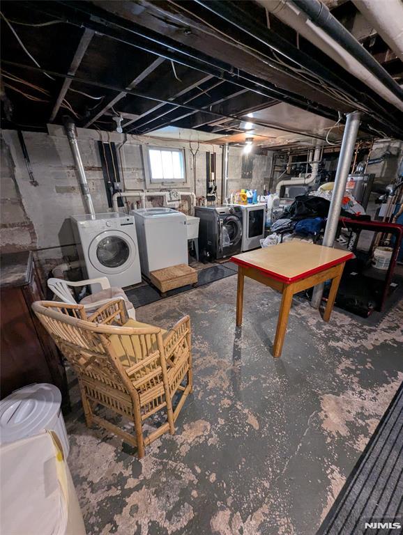 basement featuring separate washer and dryer