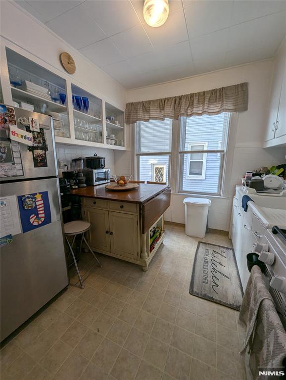 kitchen with stainless steel refrigerator