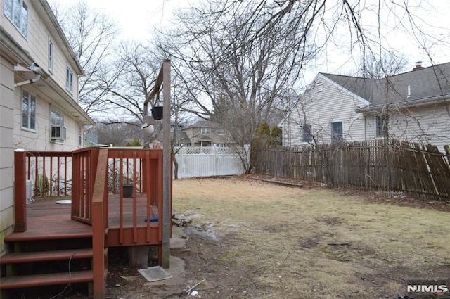 view of yard with a deck