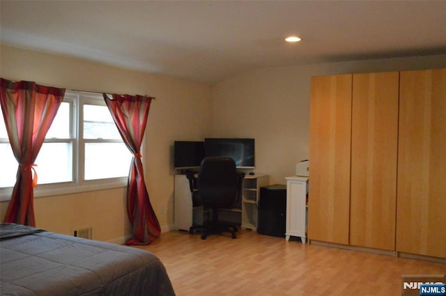 bedroom featuring light hardwood / wood-style floors