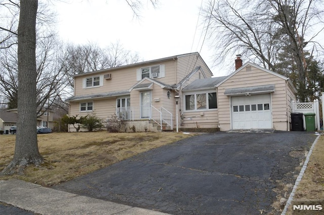 front facade with a garage