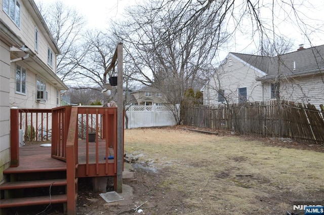 view of yard with a wooden deck