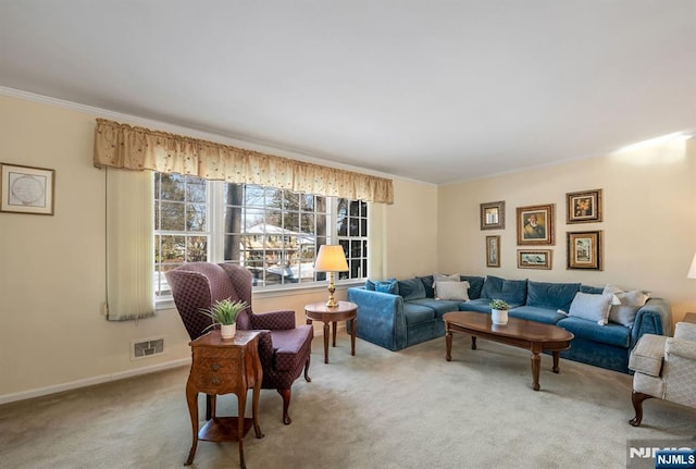 living room with crown molding and carpet floors