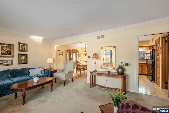 carpeted living room with crown molding