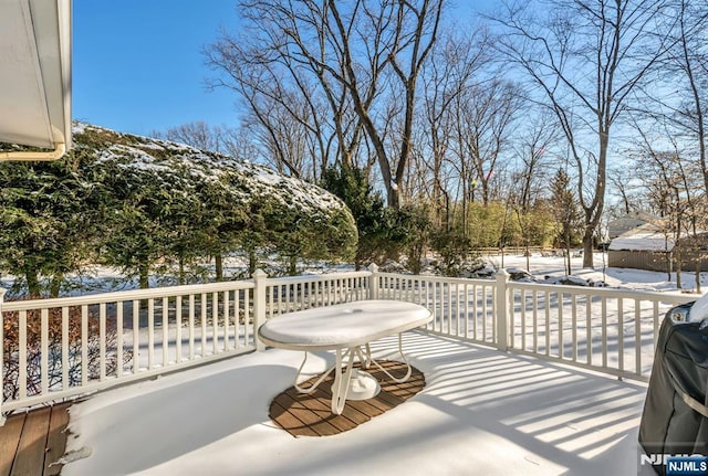 view of snow covered patio