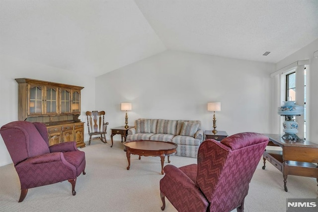 living room with light carpet and lofted ceiling