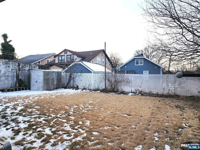 view of yard covered in snow