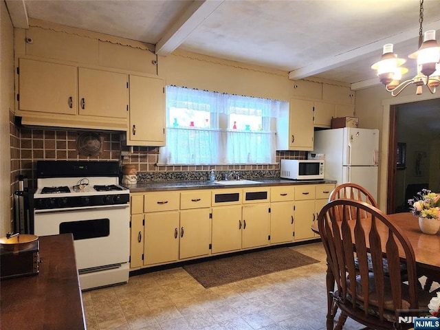 kitchen with sink, white appliances, tasteful backsplash, and beamed ceiling