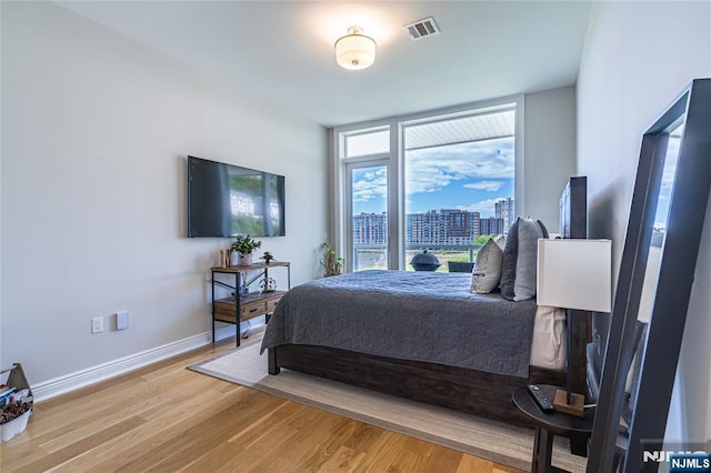 bedroom featuring light hardwood / wood-style floors