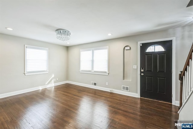 entryway featuring dark wood-type flooring