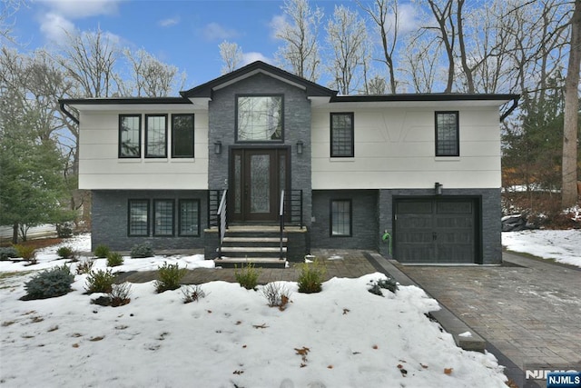 view of front of property with a garage