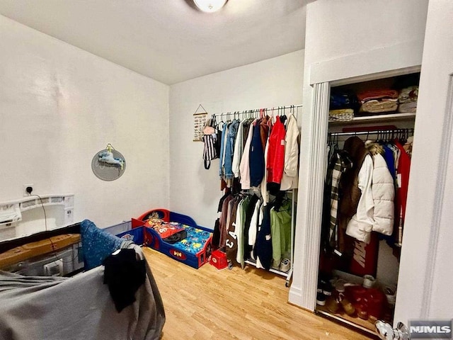 bedroom featuring hardwood / wood-style flooring