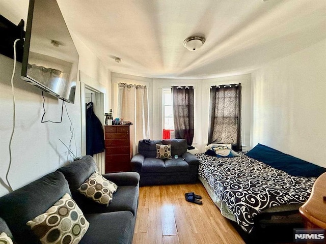 bedroom featuring hardwood / wood-style floors