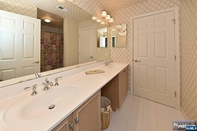 bathroom featuring vanity and tile patterned floors