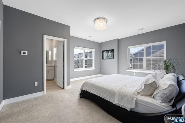 bedroom with light carpet