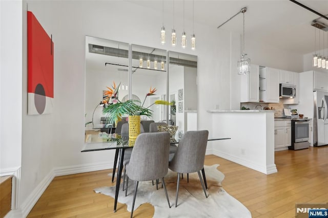 dining area featuring light hardwood / wood-style flooring