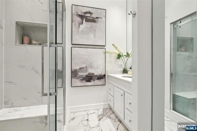 bathroom featuring vanity and walk in shower