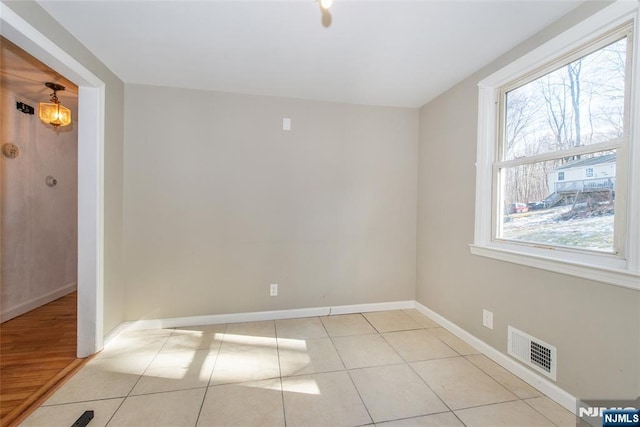 view of tiled spare room